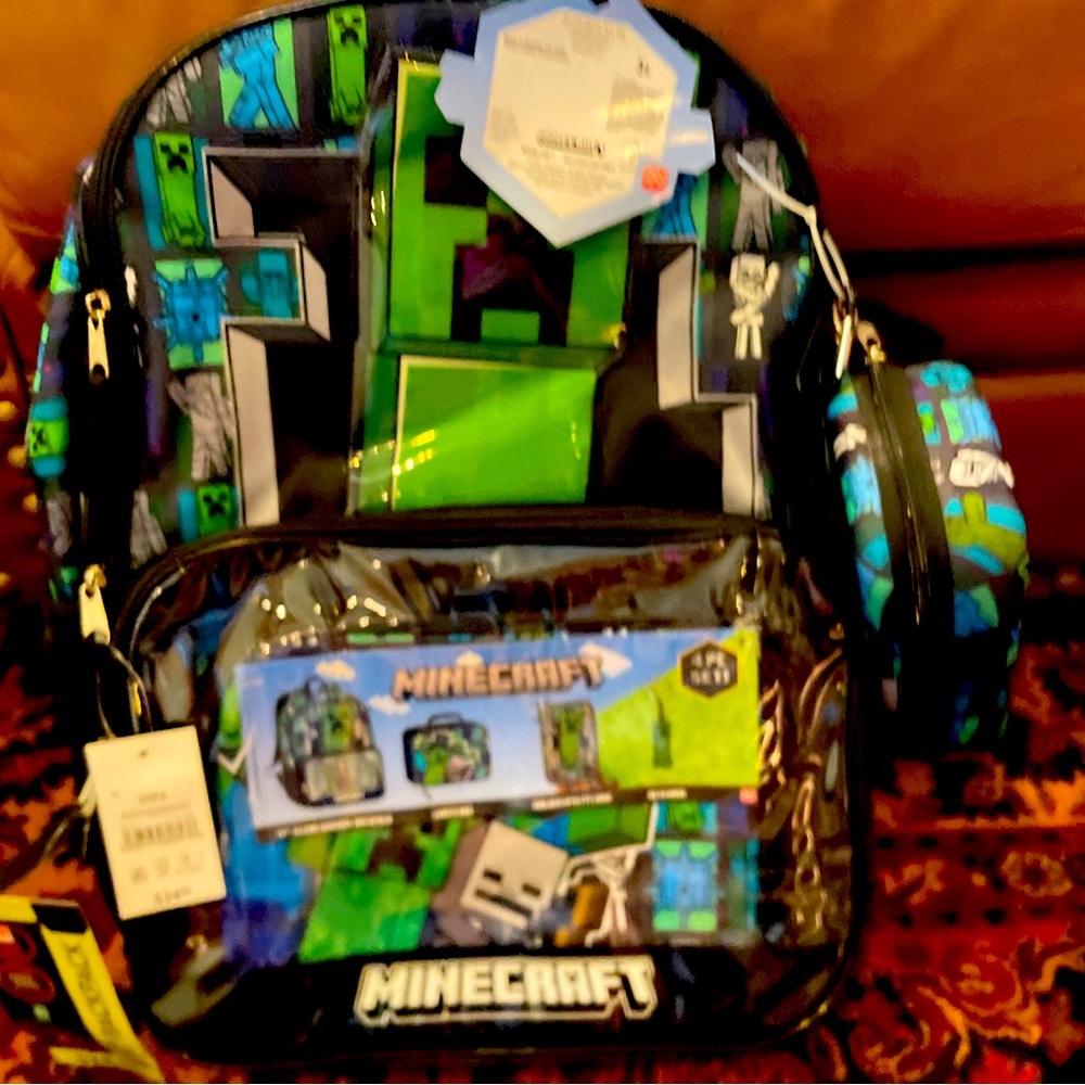 new Minecraft Creeper 17"
Laptop Backpack and Lunch
Bag
Set, 4-Piece, Black